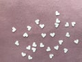 Heart shape white papers on light pink plain fabric, `valentine`s dayÃ¢â¬Â concept Royalty Free Stock Photo